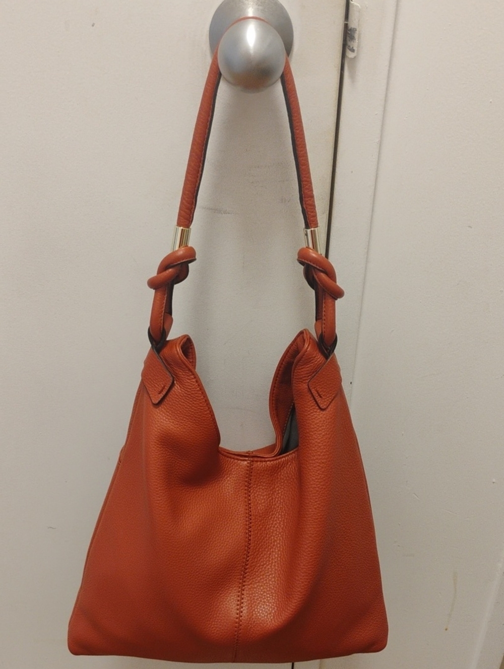 Vince Camuto Orange Pebbled Leather Hobo with Knotted Strap, 14"Strap Drop
